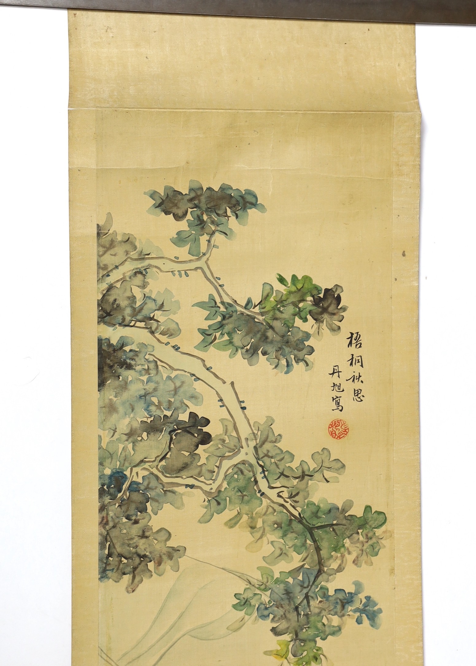 A Chinese scroll painting on silk of a mother watching her children play in a garden, 19th century, image 95cm x 21cm